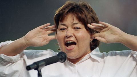 Roseanne Barr holds as she screams the National Anthem in 1990.