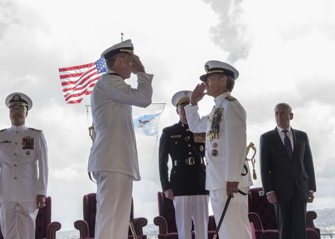 Adm. Phil Davidson, left, relieves Adm. Harry Harris, right, as commander of US Indo-Pacific Command during a ceremony at Pearl Harbor, Hawaii, on Wednesday.