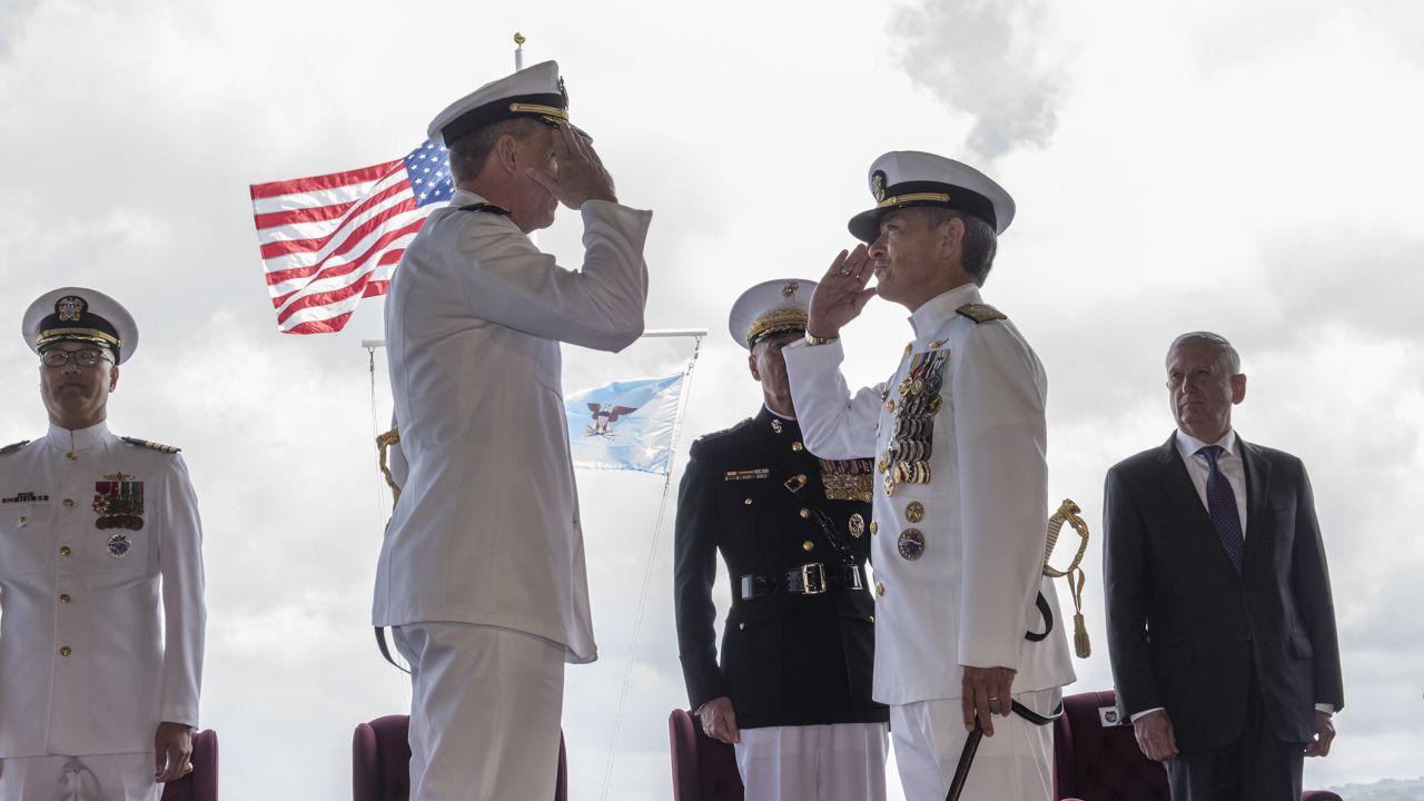 Adm. Phil Davidson, left, relieves Adm. Harry Harris, right, as commander of US Indo-Pacific Command during a ceremony at Pearl Harbor, Hawaii, on Wednesday.