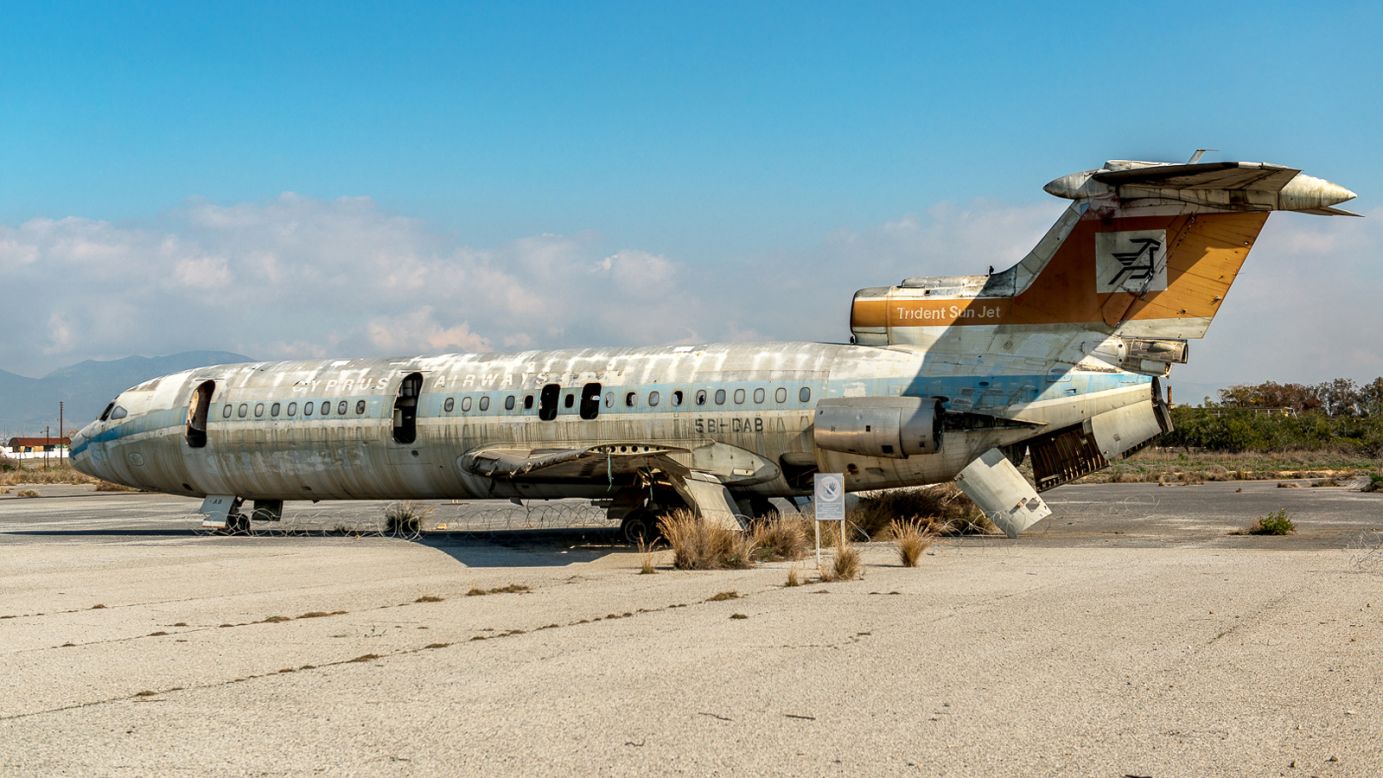 <strong>Permanently grounded:</strong> A decomposing Cyprus Airways Trident Sun Jet passenger plane stands between the hangars and terminal building of Nicosia International Airport in Cyprus.