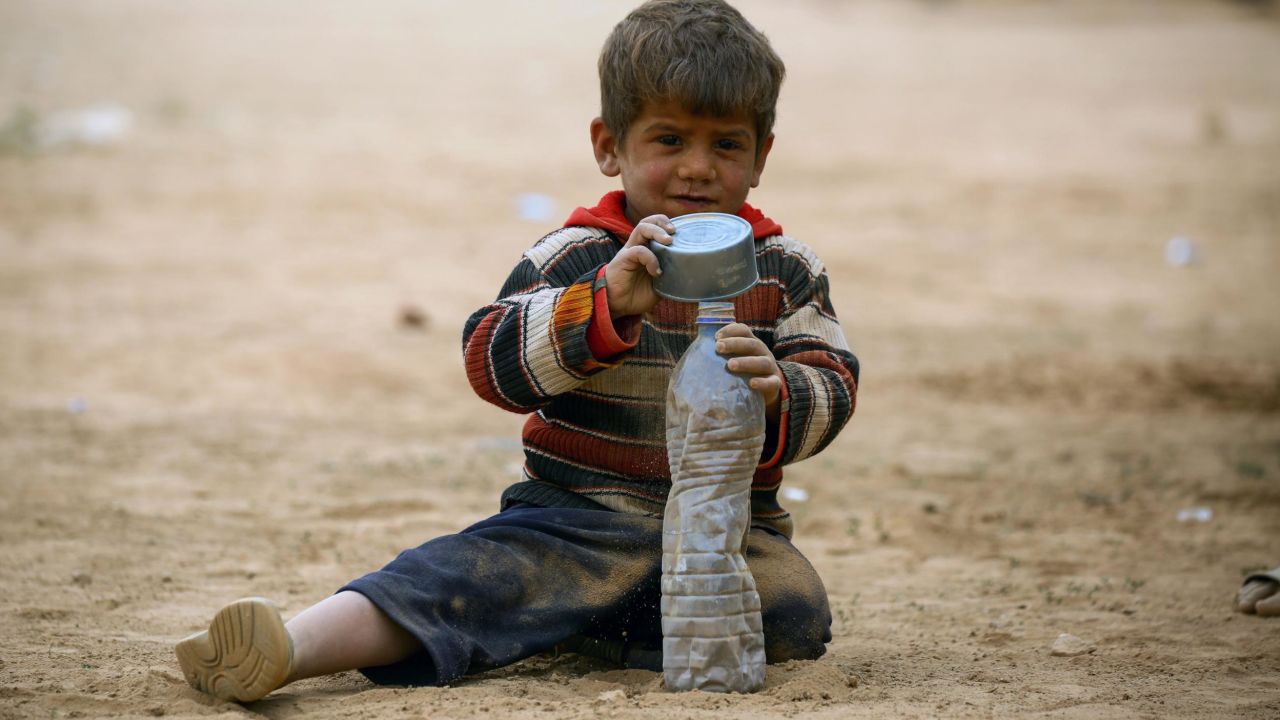 A displaced Syrian child at a temporary camp in the village of Ain Issa on April 28, 2017.