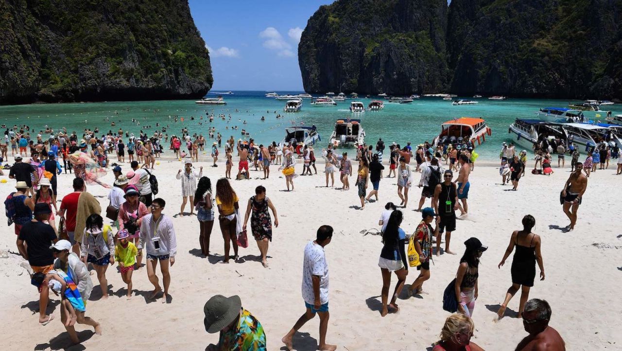 A crowd of tourists visits Maya Bay in April, prior to the closure. 