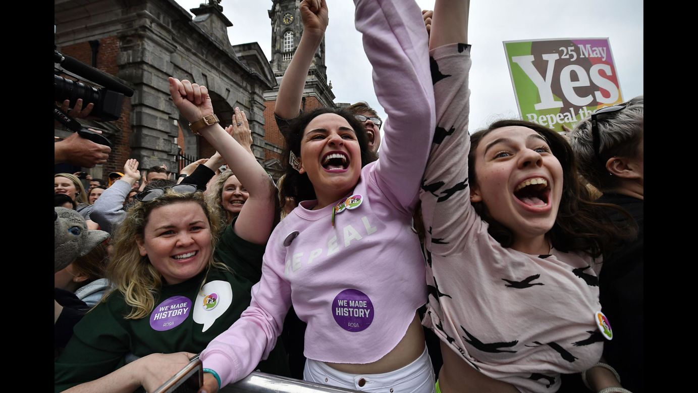 People celebrate at Ireland's Dublin Castle on Saturday, May 26, after it was announced that voters in the country had decided <a href="https://www.cnn.com/2018/05/26/europe/ireland-count-abortion---intl/index.html" target="_blank">to repeal the Eighth Amendment,</a> which bans abortion unless there is a "real and substantial risk" to the mother's life. 