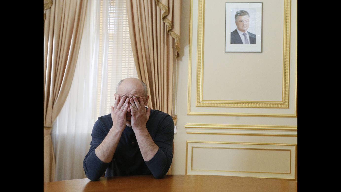 Russian journalist Arkady Babchenko rubs his face during an interview with foreign media in Kiev, Ukraine, on Thursday, May 31. A day earlier, <a href="https://www.cnn.com/2018/05/31/europe/russian-journalist-defends-staged-murder-intl/index.html" target="_blank">he stunned observers</a> when he showed up alive at a news conference a day after his reported killing. He said that with the help of Ukrainian security services, he faked his death to foil an assassination plot against him.