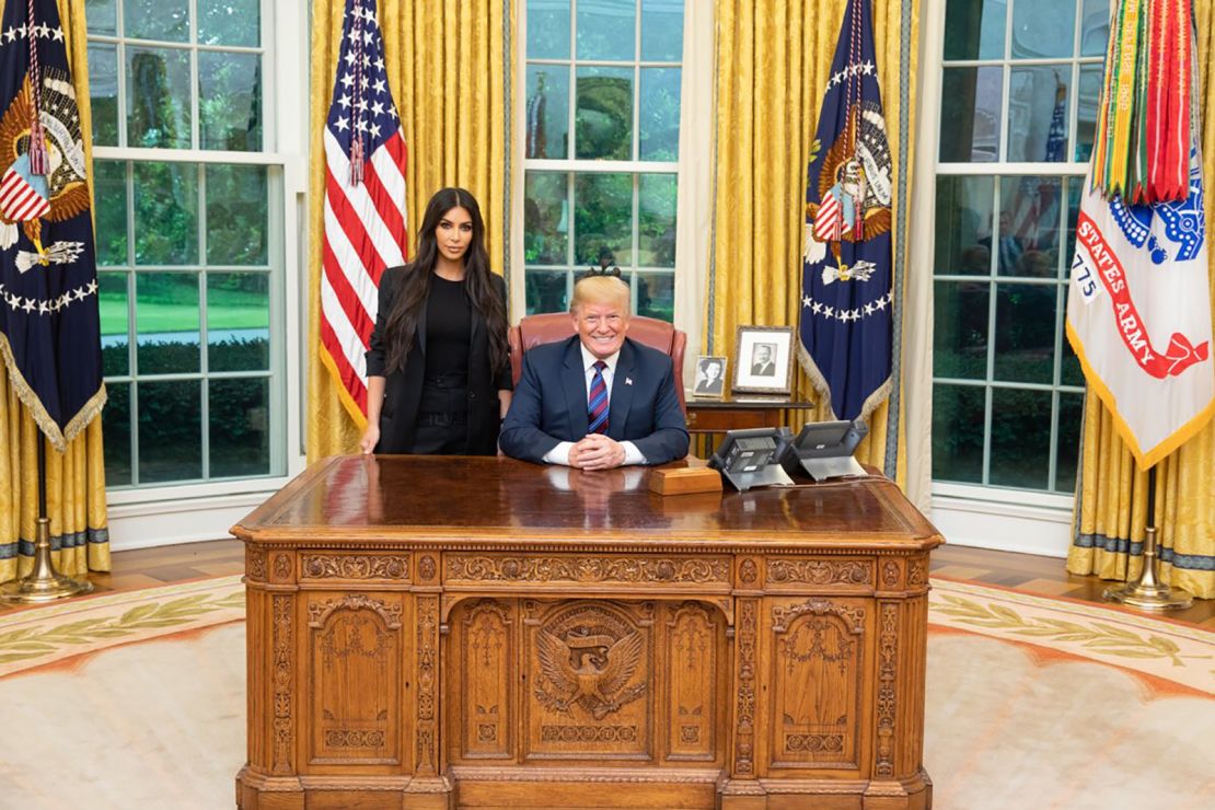 Kim Kardshian West poses for a photo with President Trump in May 2018.