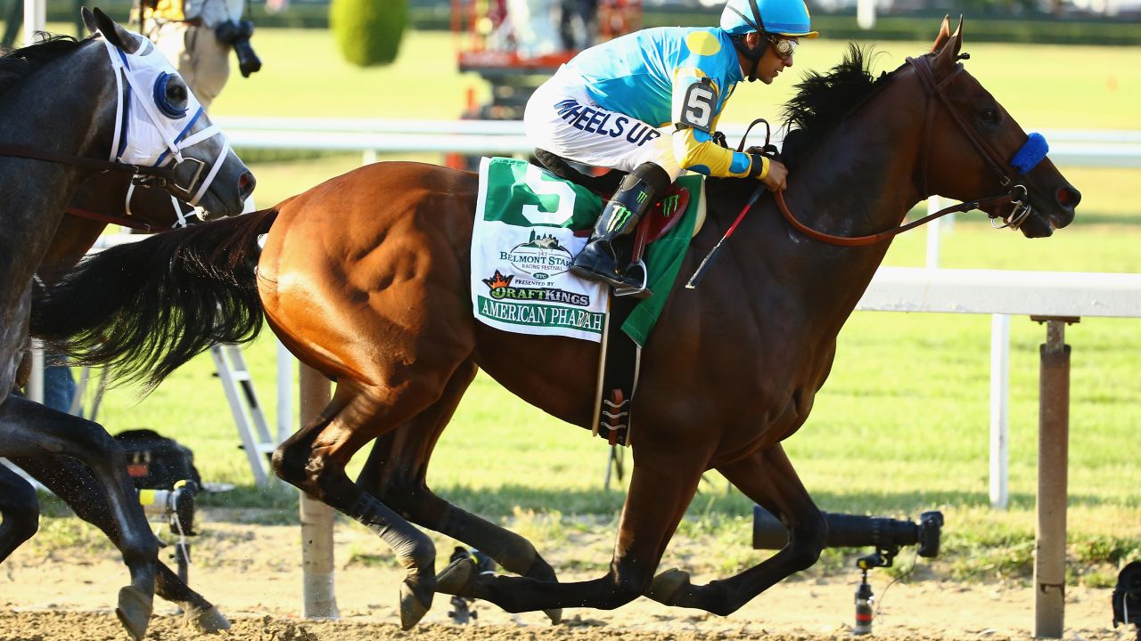 ELMONT, NY - JUNE 06:  Victor Espinoza rides atop American Pharoah #5 during the 147th running of the Belmont Stakes  at Belmont Park on June 6, 2015 in Elmont, New York.  (Photo by Al Bello/Getty Images)