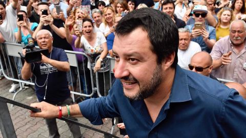 Matteo Salvini -- now Italy's Interior Minister -- walks on stage during a campaign rally in May.