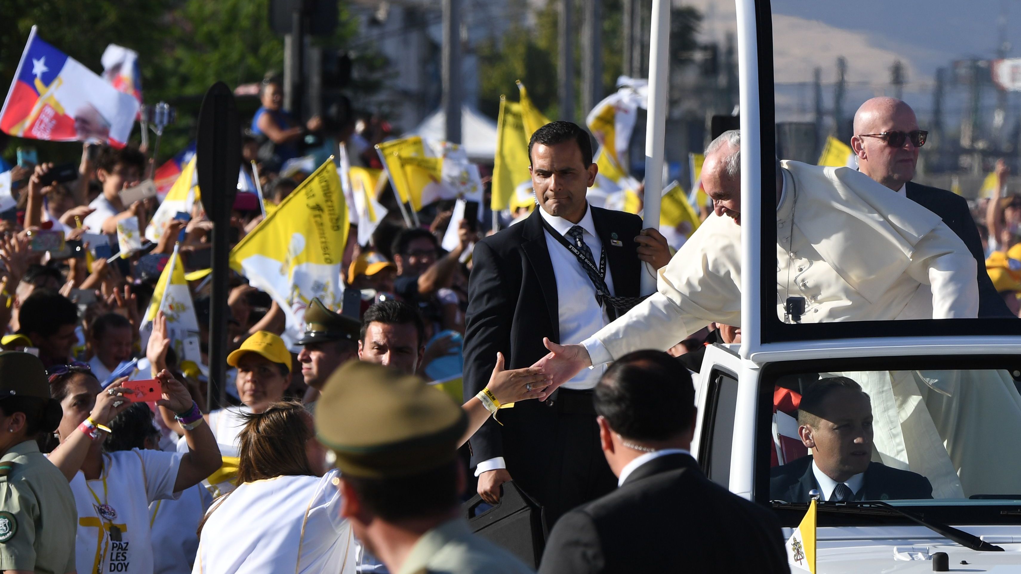 Pope Francis waves from the popemobile in Santiago, Chile on January 16, 2018.