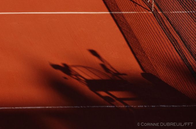 Dubreuil says one of her favorite times to take photos is when the sun begins to set over Paris. "A special time to photograph the action at Roland Garros is at around 6 pm, when the shadows start falling over the court," she explains. "After 7 pm, you have half of the court in the dark and the player can be in the sun with a lovely shadow. I have done a lot of good pictures there, especially of Rafa but also Serena Williams." <br />