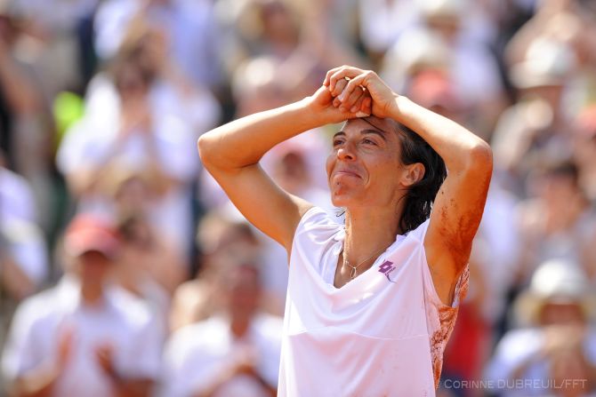 For Dubreuil, the expressive Italian Francesca Schiavone, seen here shortly after rolling on the clay after winning the 2010 French Open title, is a photographer's dream.