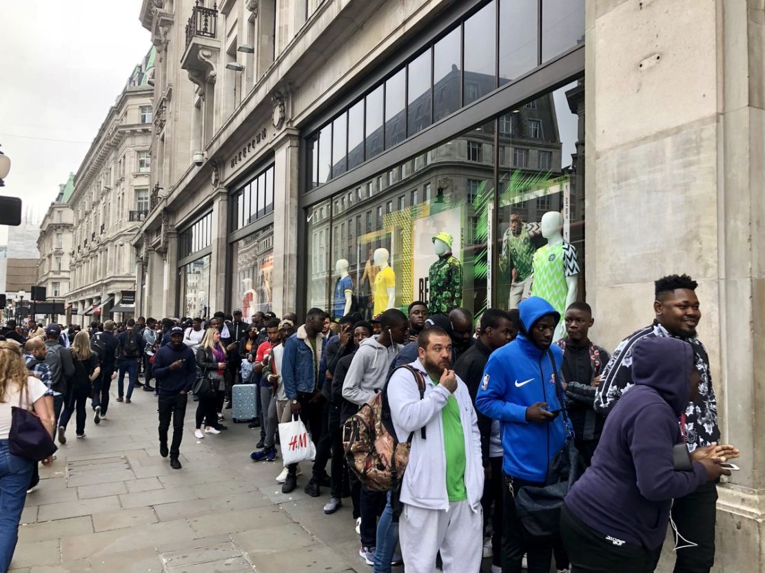 Football fans queue outside Nike store in Oxford, London for the newly released Nigerian kits designed by Nike for the 2018 World Cup on June 1, 2018.