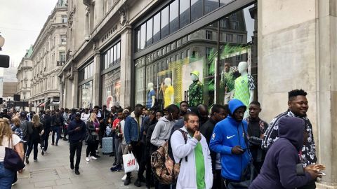 Football fans queue outside Nike store in Oxford, London for the newly released Nigerian kits designed by Nike for the 2018 World Cup on June 1, 2018.