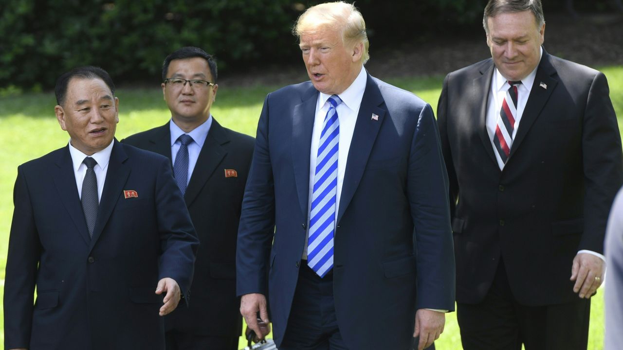 US President Donald Trump (C-R), flanked by US Secretary of State Mike Pompeo (R), walks with North Korean Kim Yong Chol (L) at the White House on June 1, 2018 in Washington,DC. (SAUL LOEB/AFP/Getty Images)