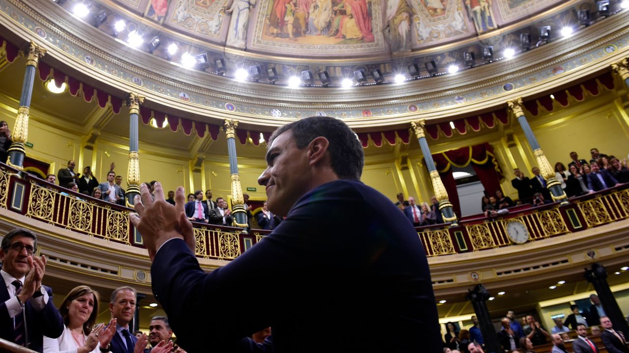 Spain's new Prime Minister Pedro Sanchez acknowledges applause after a vote on a no-confidence motion at the Lower House of the Spanish Parliament in Madrid on June 01, 2018. - Spain's parliament ousted on June 1, 2018 Prime Minister Mariano Rajoy in a no-confidence vote sparked by fury over his party's corruption woes, with his Socialist arch-rival Pedro Sanchez automatically taking over. (Photo by PIERRE-PHILIPPE MARCOU / AFP)        (Photo credit should read PIERRE-PHILIPPE MARCOU/AFP/Getty Images)