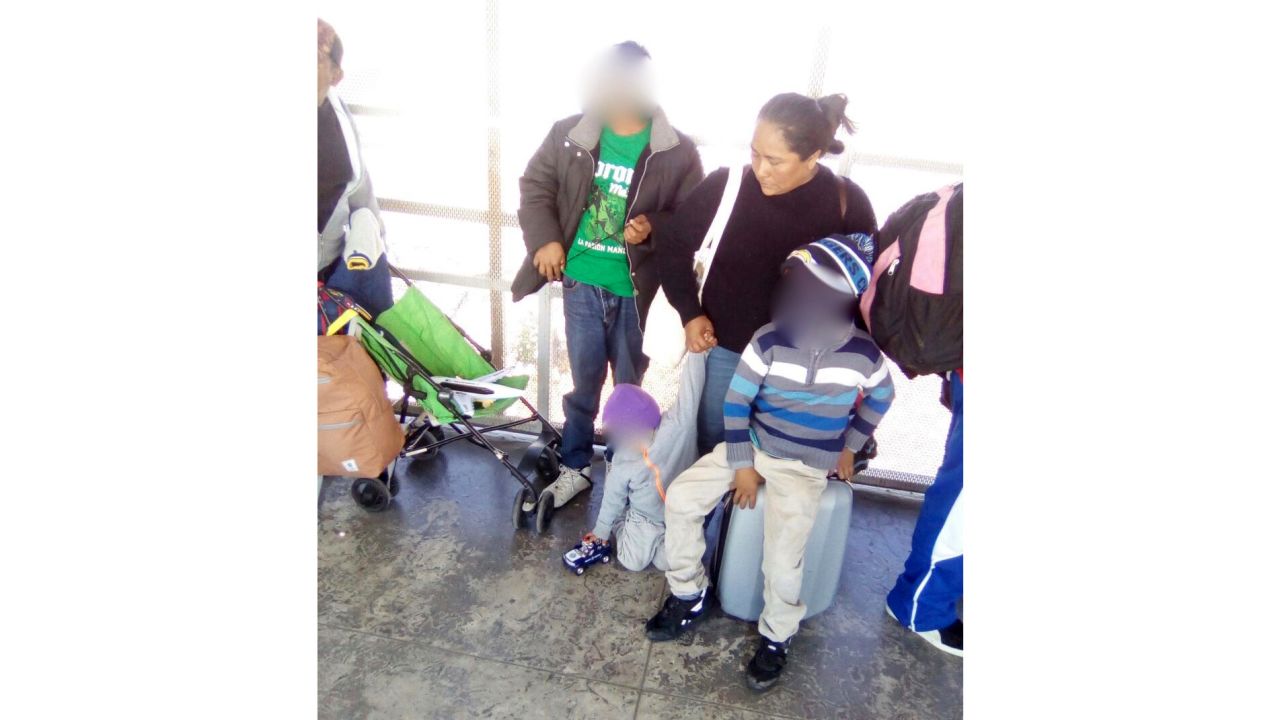 Maria and her three youngest children wait at the San Ysidro Port of Entry to the United States shortly before requesting asylum.Source: Ignacio Villatoro