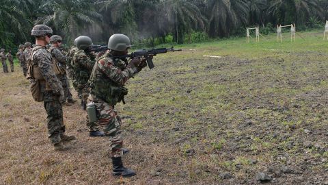 US Marines assigned to Special Purpose Marine Air-Ground Task Force-Crisis Response-Africa ground combat element trained with the Cameroon Marines in infantry tactics at a training site in Cameroon, Feb. 13, 2018.