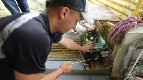 Luis Miguel Vera Romero is still using a generator to power his father's nebulizer machine, the device he needs to cope with asthma.
