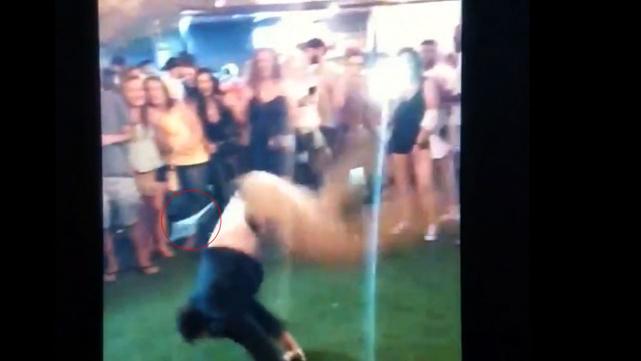 The off-duty law enforcement officer lost his gun as he performed a back handspring.
