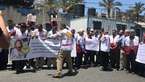 Palestinian medical workers protest outside a UN office in Gaza City.