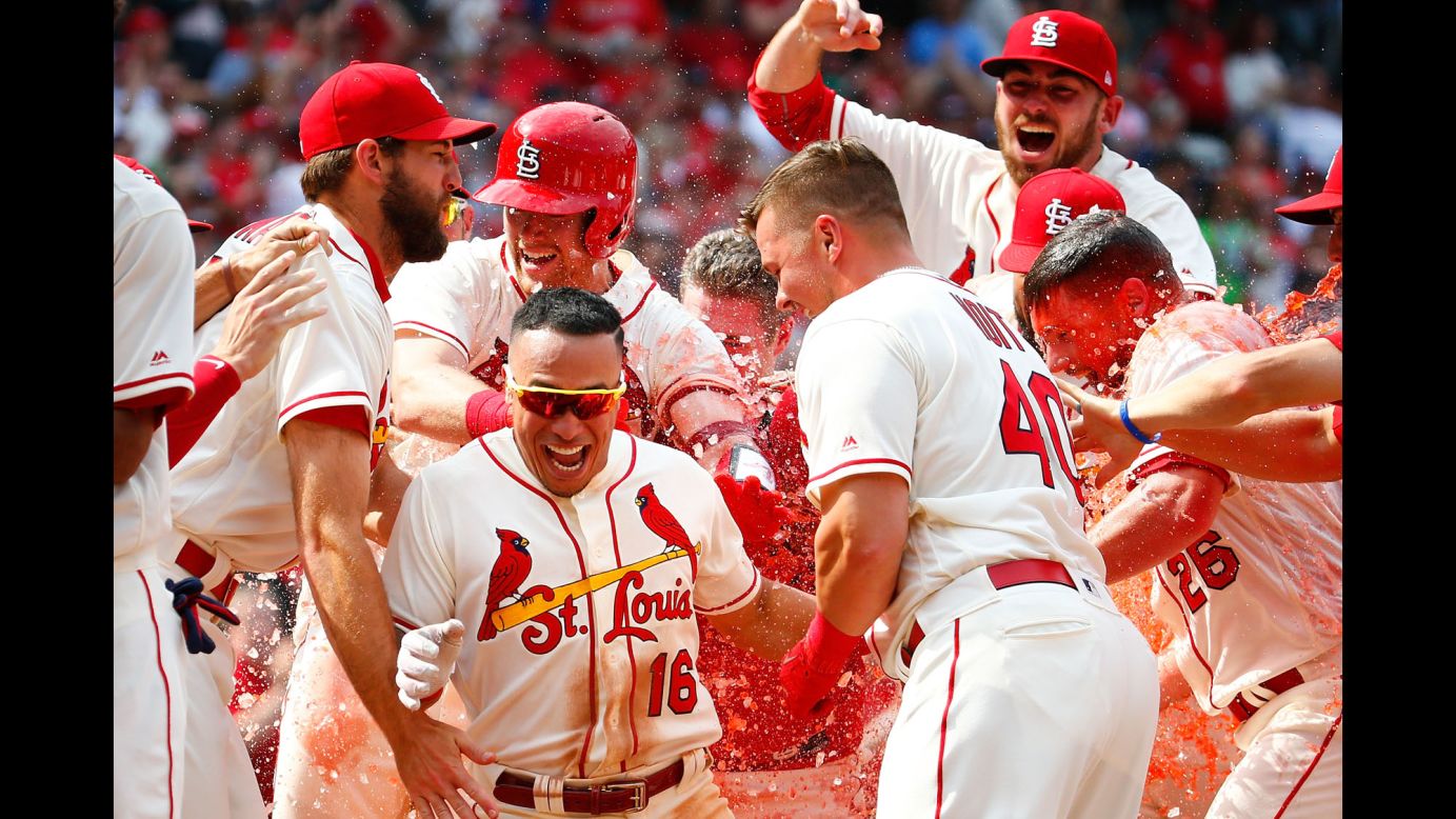 Kolten Wong (16) of the St. Louis Cardinals celebrates with his teammates after hitting a walk-off home run against the Pittsburgh Pirates in the ninth inning at Busch Stadium on Saturday, June 2, in St. Louis, Missouri.  