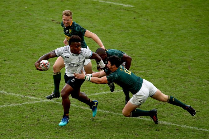 Fiji's Josua Tuisova looks for an offload in the final of the London Sevens against South Africa. His side ran out <a href="index.php?page=&url=http%3A%2F%2Fwww.cnn.com%2F2018%2F06%2F03%2Fsport%2Flondon-sevens-fiji-south-africa-rugby-intl-spt%2Findex.html">21-17 victors</a> to take control of the series. 