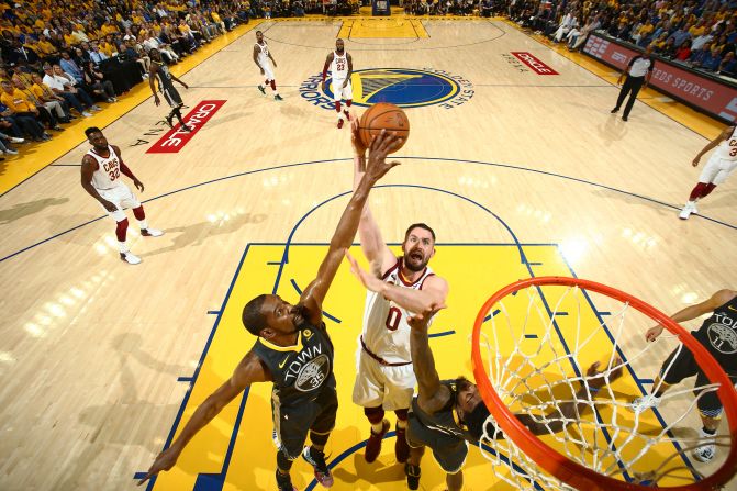 Durant blocks Love during the first half of Game 2.