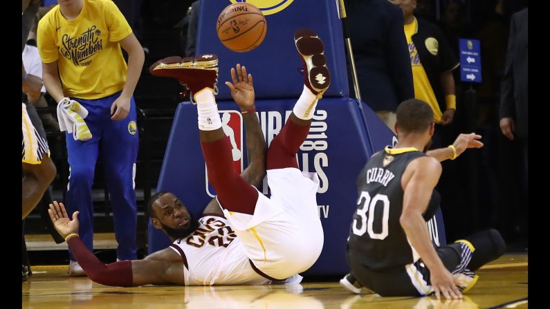 James falls to the floor after a second-half collision in Game 2. He scored 29 points in the game and had 13 assists and nine rebounds.