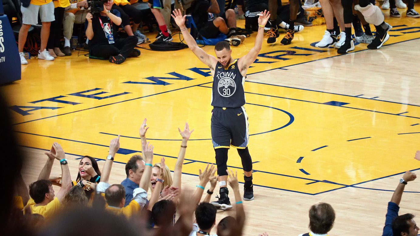 Golden State Warriors guard Stephen Curry celebrates after beating the Cleveland Cavaliers in Game 2 of the NBA Finals on Sunday, June 3. The Warriors won 122-103.