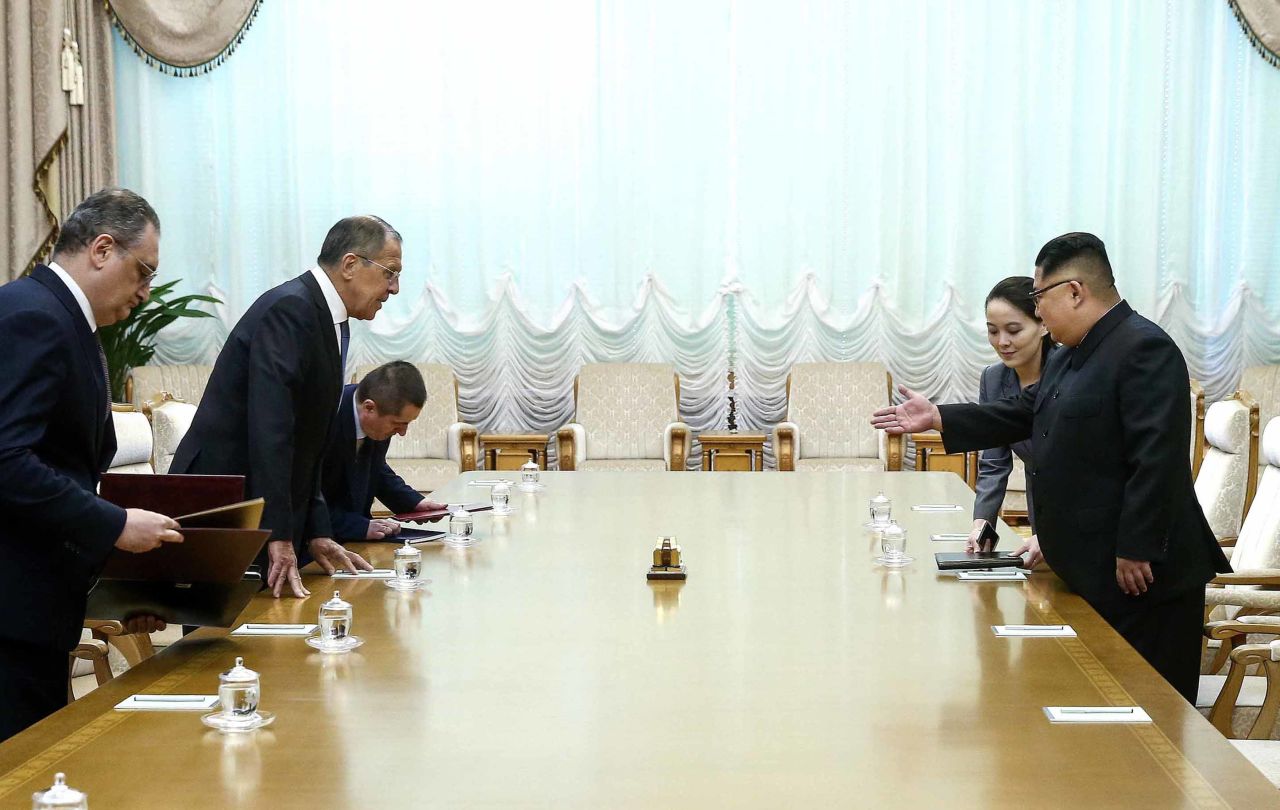 Russia's Deputy Foreign Minister Igor Morgulov (left) and Lavrov (second from left) sit down for a meeting with Kim (right) at Kumsusan Palace.