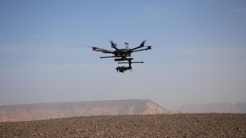 A drone takes photos of Al-Ula's archaeological sites.