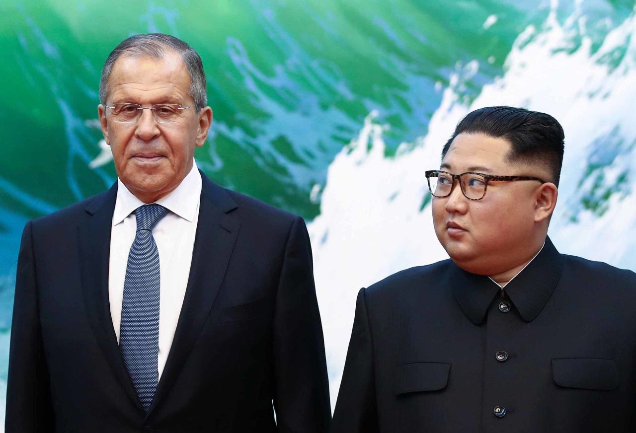 Lavrov and Kim pose for a photo.