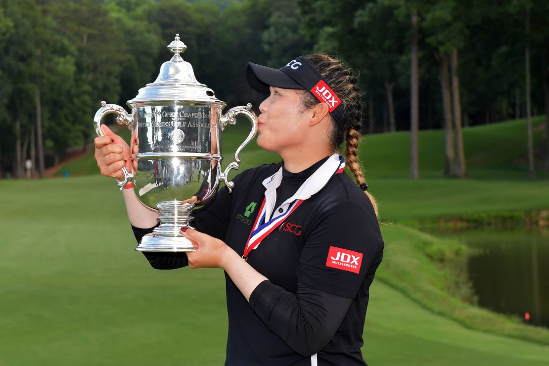 Jutanugarn kisses the US Women's Open trophy after surviving one of the scares of her career.