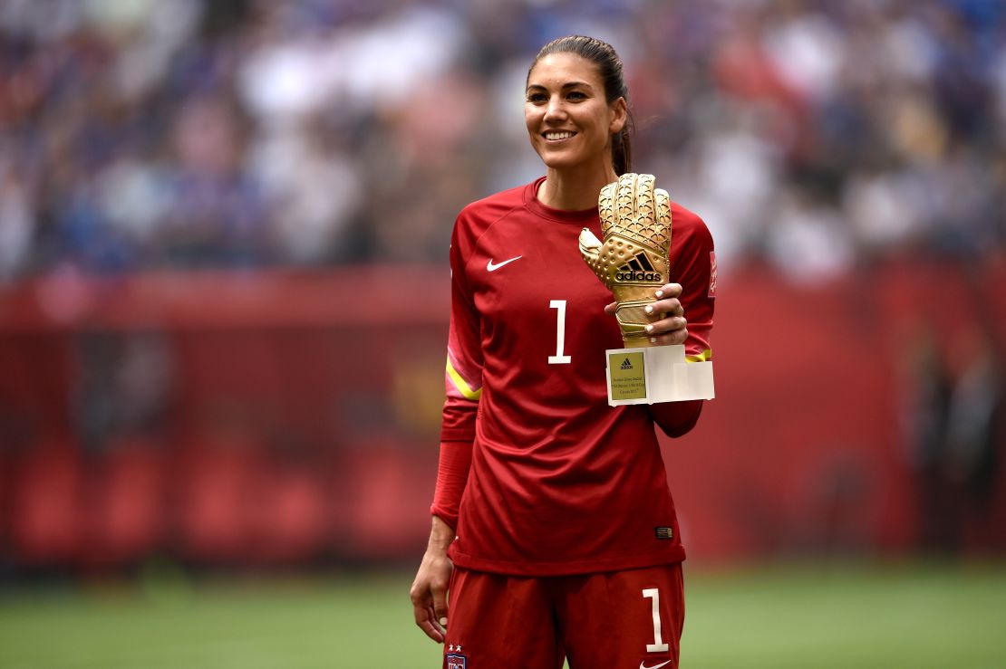 Solo poses with the Golden Glove award after the 2015 World Cup final in Canada. 