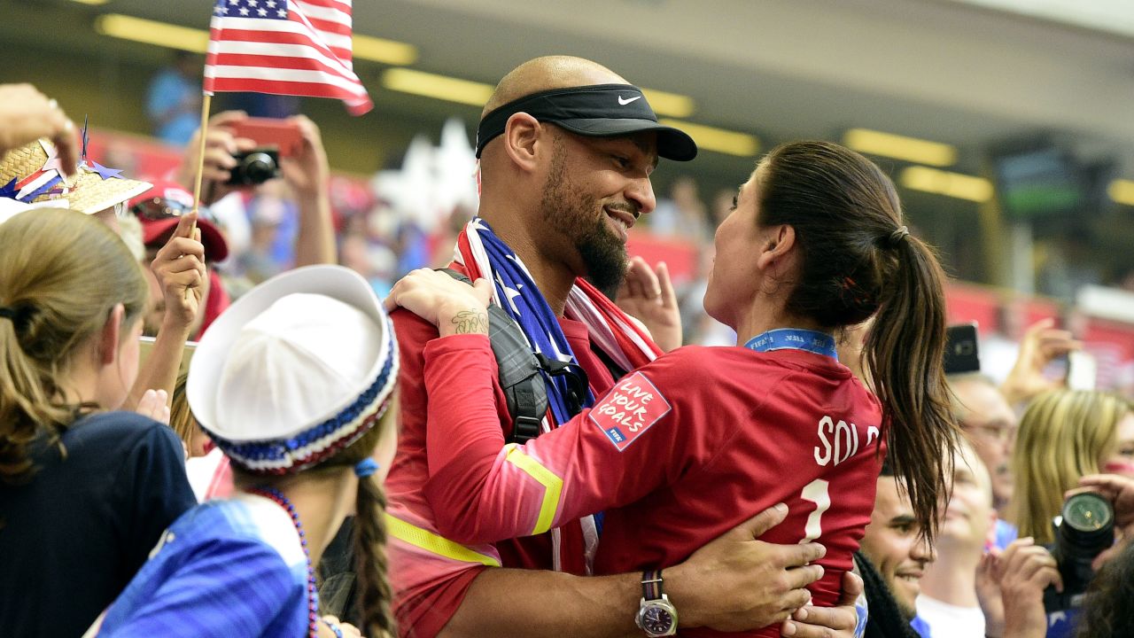 Solo is congratulated by husband Jerramy Stevens after the US won the 2015 World Cup.