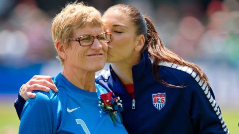 Solo and her mother, Judy Solo, hug on the field prior to introductions on Mother's Day before an international friendly match against Ireland on May 10, 2015. 