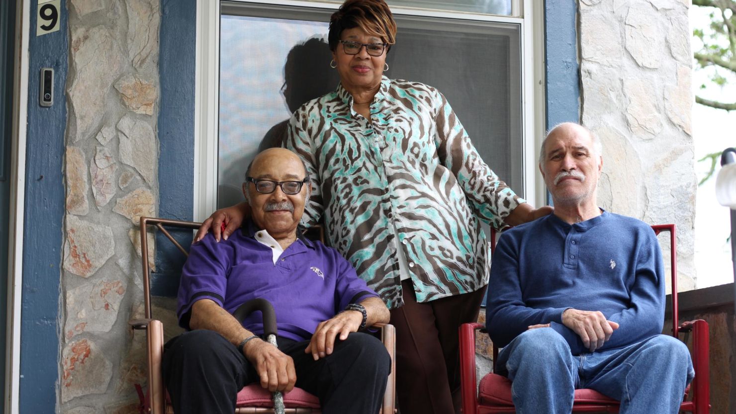 Joann West says that taking care of veterans Ralph Stepney, left, and Frank Hundt at her home in Baltimore is a "joy."