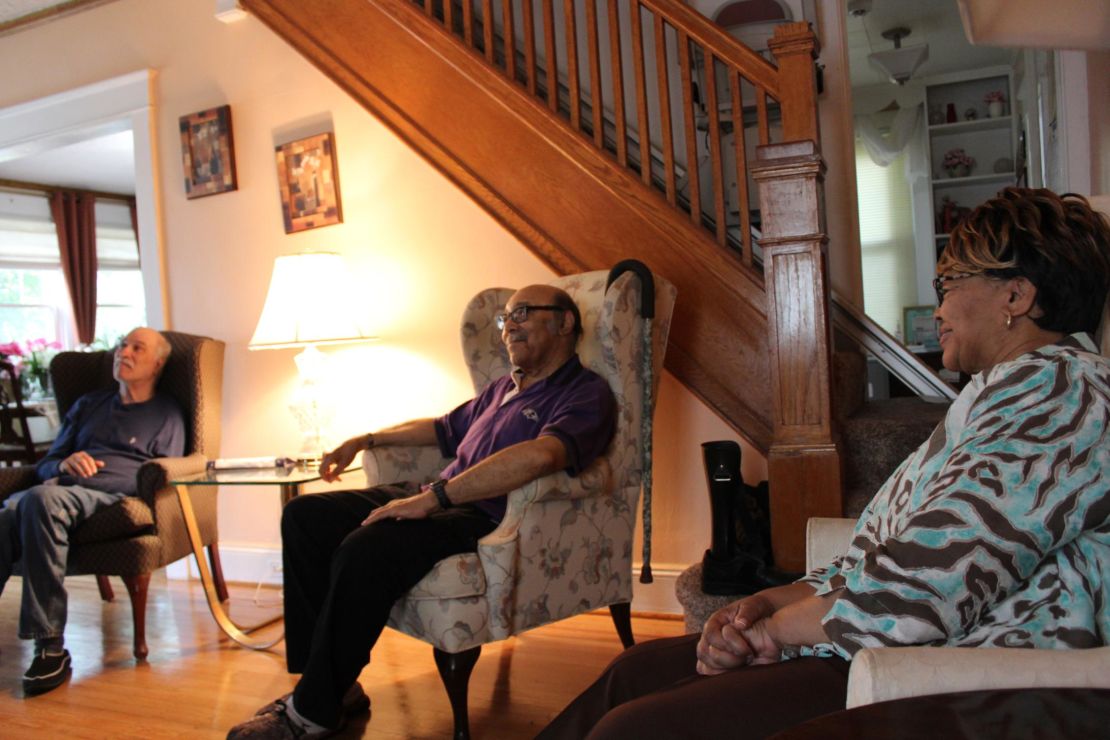 Joann West shares her home with veterans Frank Hundt, left, and Ralph Stepney.