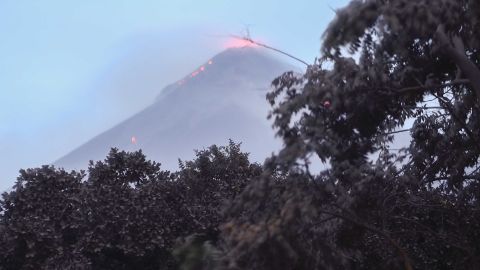Volcanic activity at Fuego is visible Monday in Los Lotes, south of Guatemala City. 