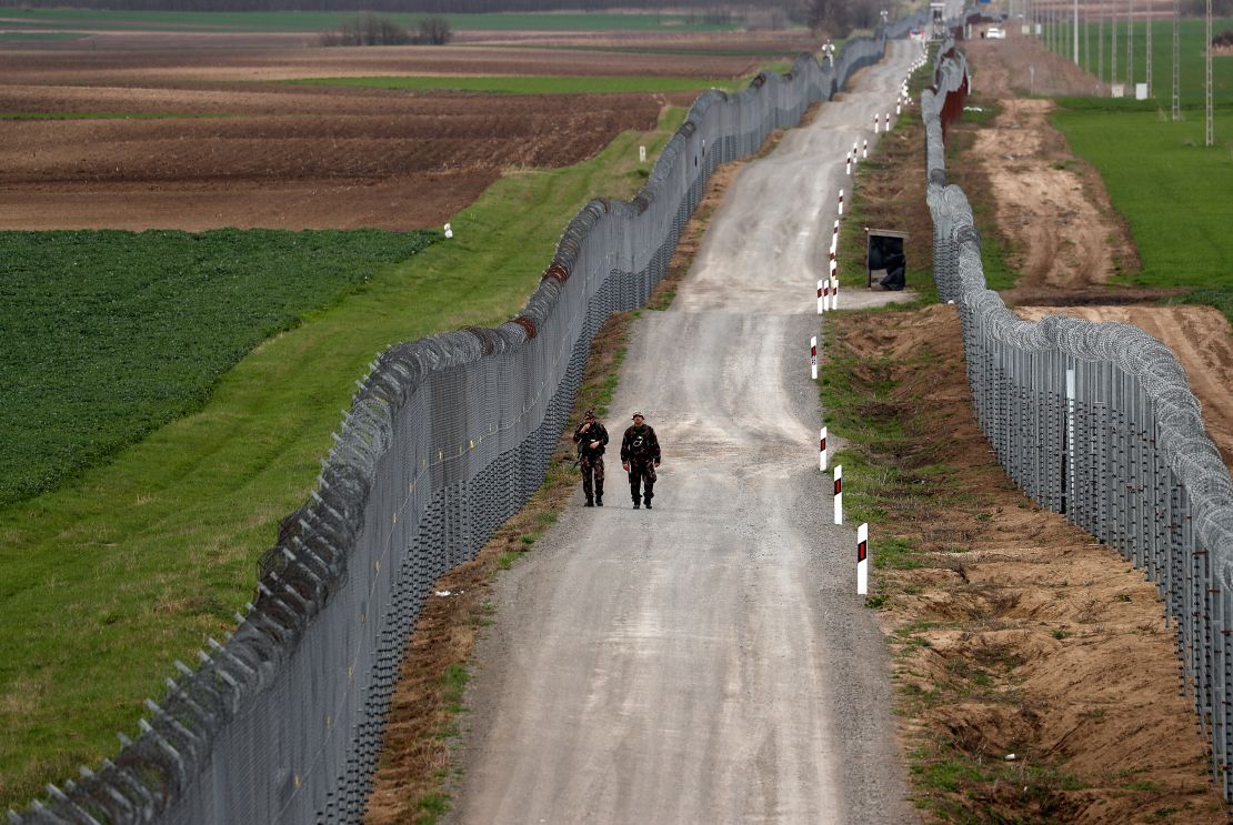 Hungarian soldiers patrol the border with Serbia in April 2018.
