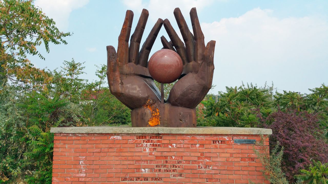 <strong>Monumental memories: </strong>The Workers' Movement Memorial designed by Kiss István, which shows two giant hands holding a ball. 
