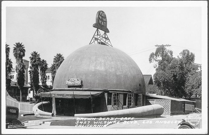 The Brown Derby, at 3427 Wilshire Boulevard in Los Angeles, 1930. "Probably one of the most famous of these buildings because it had movie stars attached to it, built across from the Coconut Grove the 1920s."