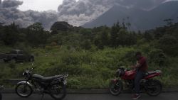 Volcan de Fuego, or Volcano of Fire, blows outs a thick cloud of ash, as seen from Alotenango, Guatemala, Sunday, June 3, 2018. One of Central America's most active volcanos erupted in fiery explosions of ash and molten rock Sunday, killing people and injuring many others while a towering cloud of smoke blanketed nearby villages in heavy ash. (AP Photo/Santiago Billy)