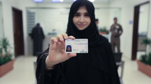 Tahani Aldosemani, Assistant Professor and Undersecretary of the Deanship of the Technology Department at Prince Sattam Bin Abdulaziz University in Al-Kharj, holds her new driving licence in a photo issued by the Kingdom of Saudi Arabia.