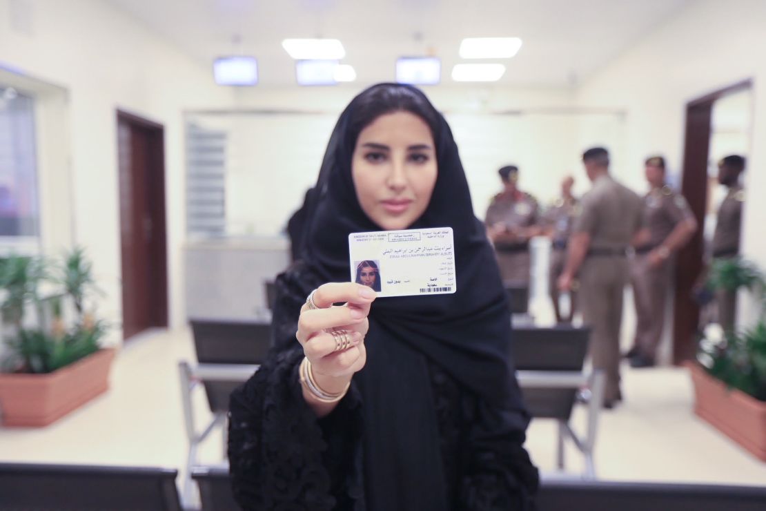 Esraa Albuti, an Executive Director at Ernst & Young, holds her new driving licence  issued by the Kingdom of Saudi Arabia. 