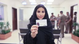 Esraa Albuti, an Executive Director at Ernst & Young, smiles as she brandishes her brand new driving licences issued Monday June 4 by the Kingdom of Saudi Arabia.