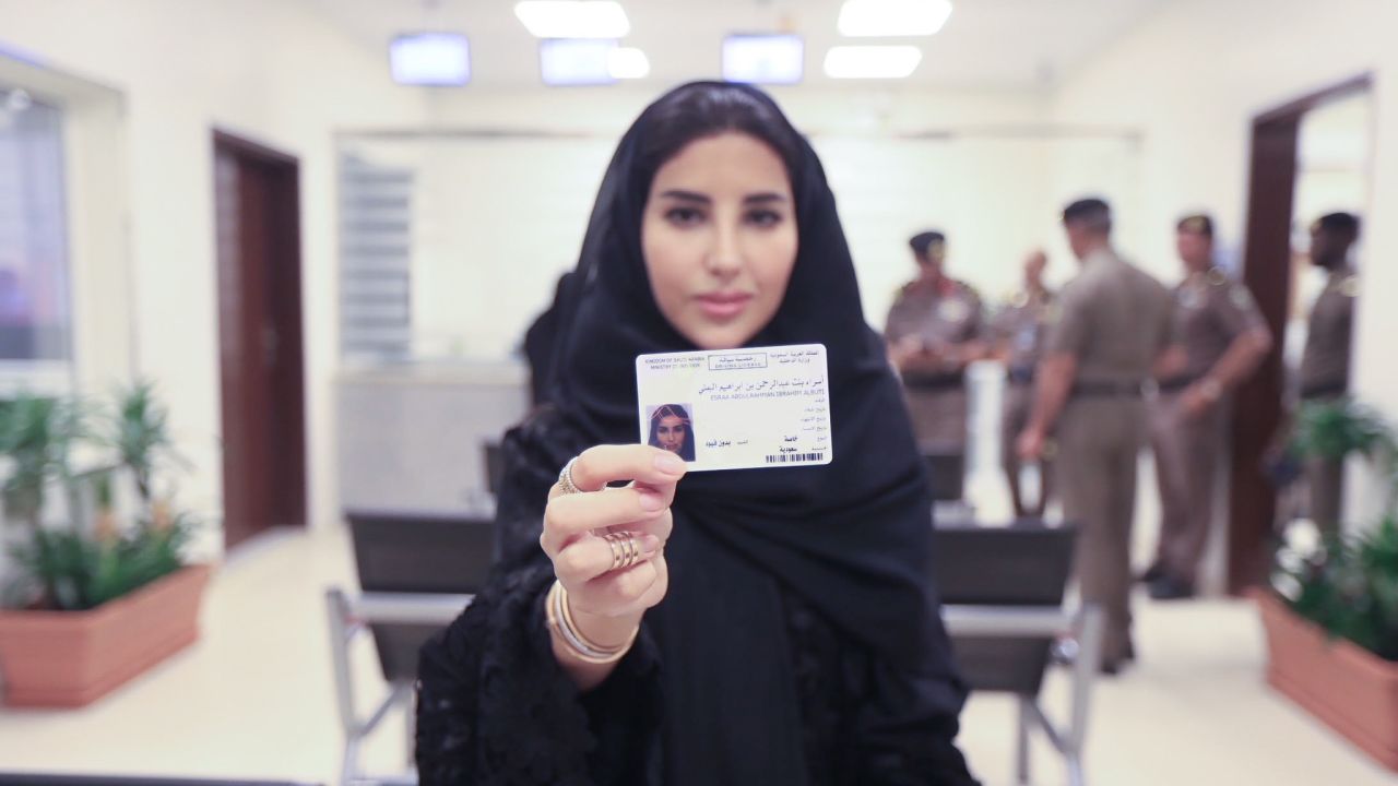 Esraa Albuti, an Executive Director at Ernst & Young, holds her new driving licence issued by the Kingdom of Saudi Arabia.