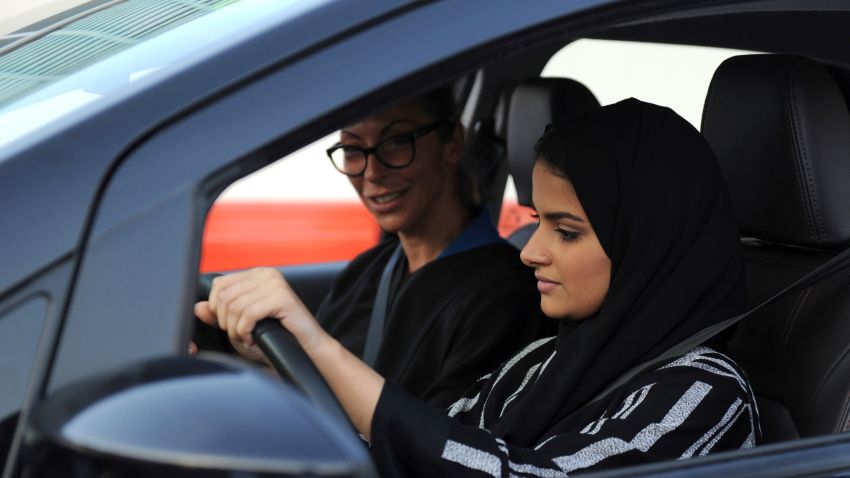 A Saudi woman (front) receives a driving lesson from an Italian instructor in Jeddah on March 7, 2018.
Saudi Arabia's historic decision in September 2017 to allow women to drive from June has been cheered inside the kingdom and abroad -- and comes after decades of resistance from female activists, many of whom were jailed for flouting the ban. / AFP PHOTO / Amer HILABI        (Photo credit should read AMER HILABI/AFP/Getty Images)