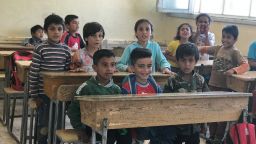 Students return to school in Raqqa, Syria.