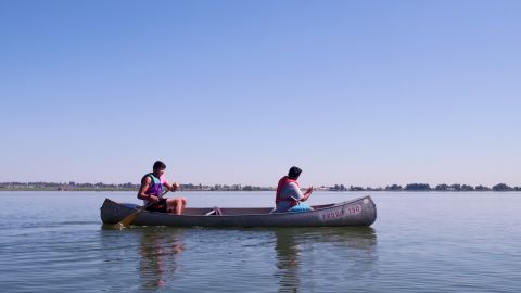 Two scouts canoeing near the campsite