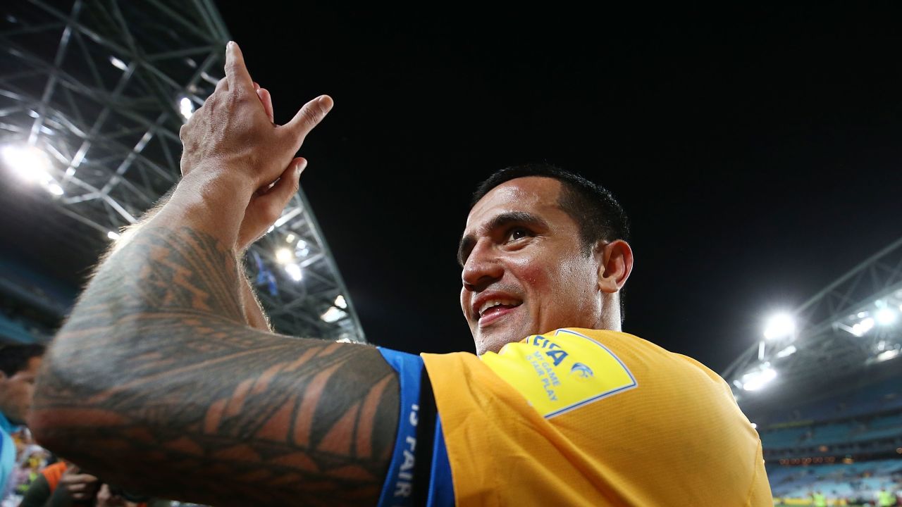 Cahill celebrates victory at the end of the 2018 World Cup Asian playoff match between Australia and Syria.